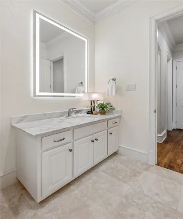 a bedroom with a bed and a table