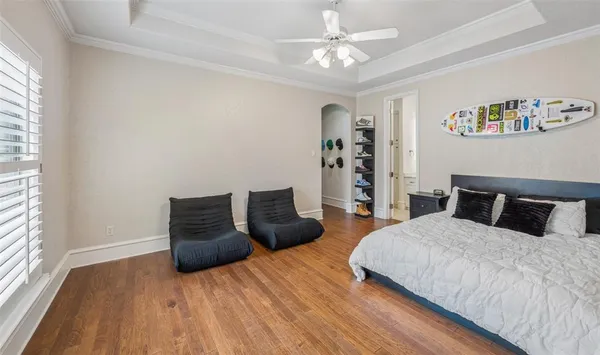 a kitchen with stainless steel appliances granite countertop a sink and a refrigerator