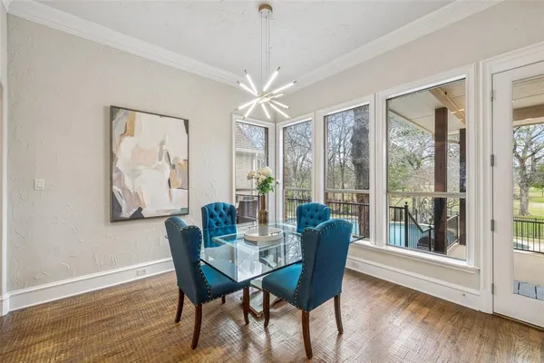 a kitchen with stainless steel appliances a stove a sink and a microwave