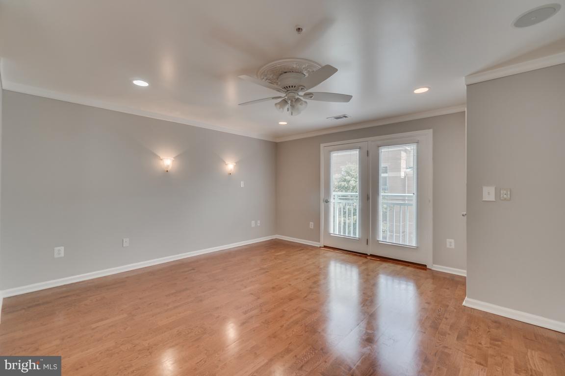 12000 Market Street, Unit 419 Reston, VA 20190 - Photo 16 of 38 Primary bedroom on first floor with en-suite bath