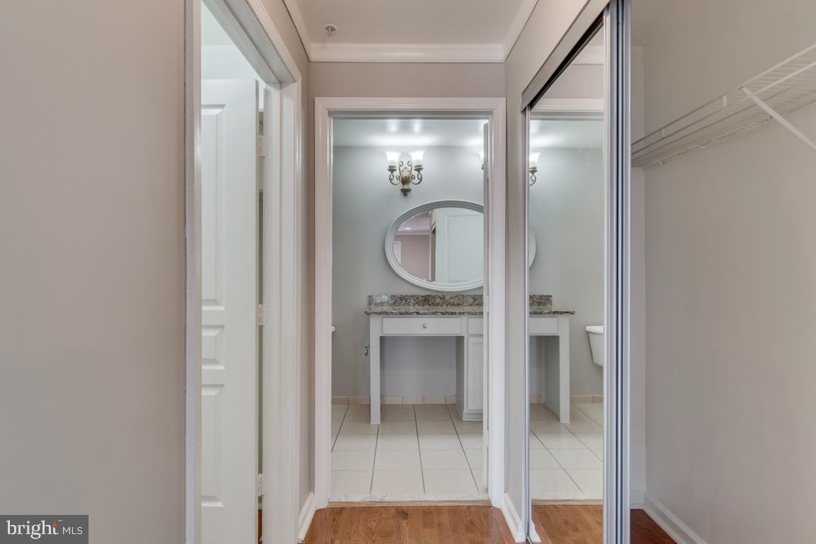 12000 Market Street, Unit 419 Reston, VA 20190 - Photo 18 of 38 Two closets, one walk-in inside primary bedroom