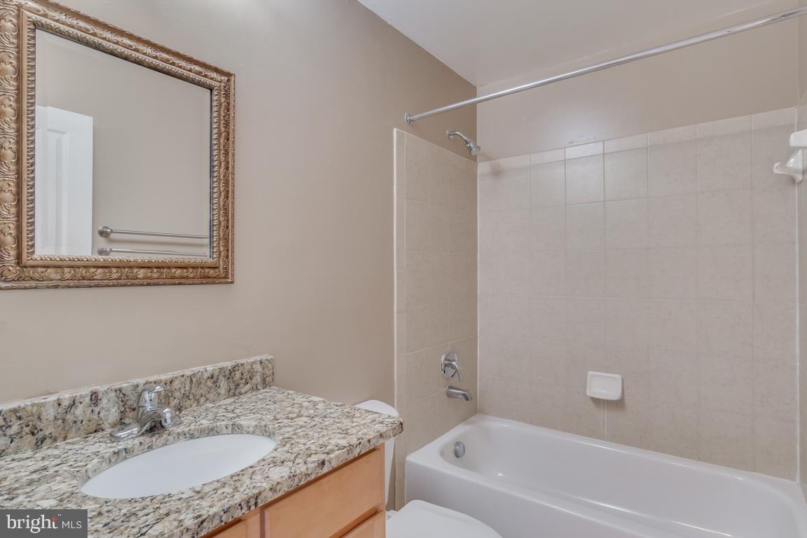 12000 Market Street, Unit 419 Reston, VA 20190 - Photo 24 of 38 Second full bath upstairs