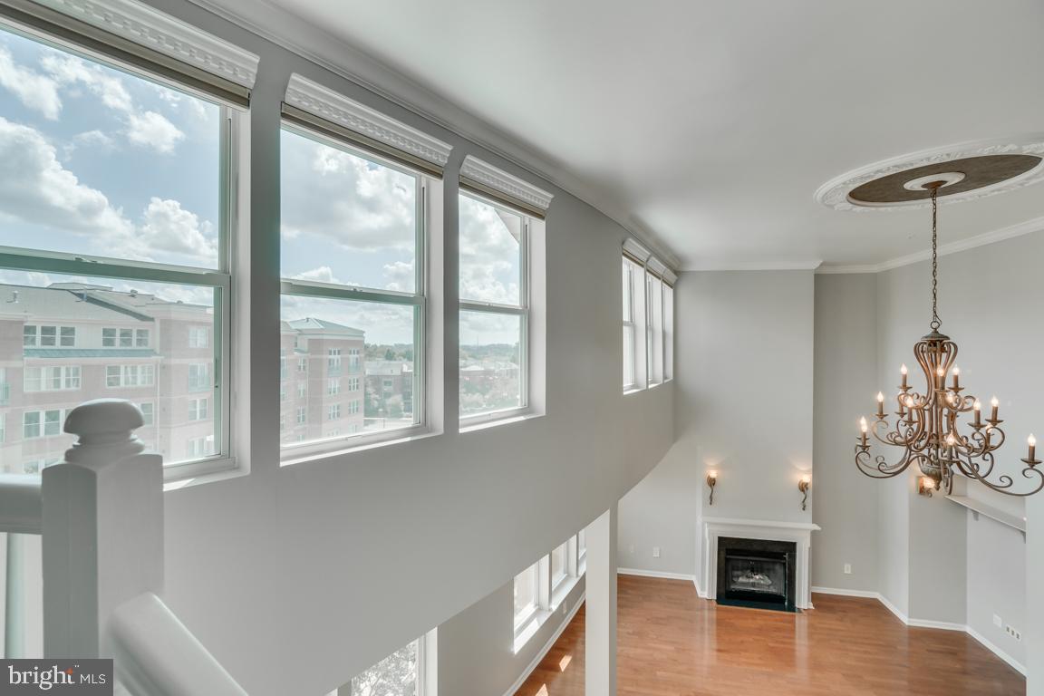 12000 Market Street, Unit 419 Reston, VA 20190 - Photo 27 of 38 Soaring natural light from upper windows