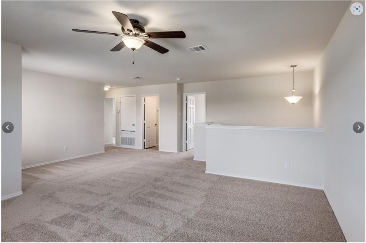 169 Marcheeta Way Leander, TX 78641 - Photo 14 of 30 a view of an empty room with a ceiling fan