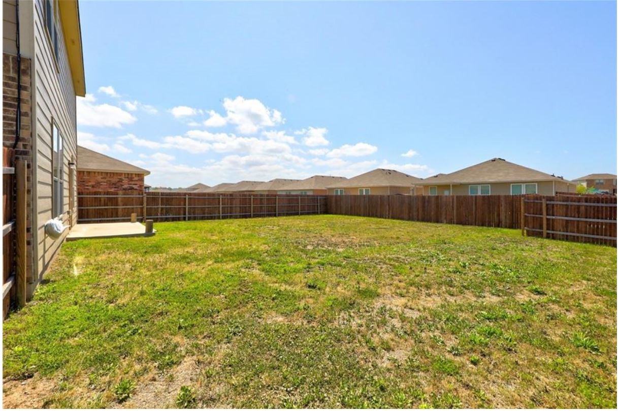 169 Marcheeta Way Leander, TX 78641 - Photo 23 of 30 a view of an outdoor space with a lake view