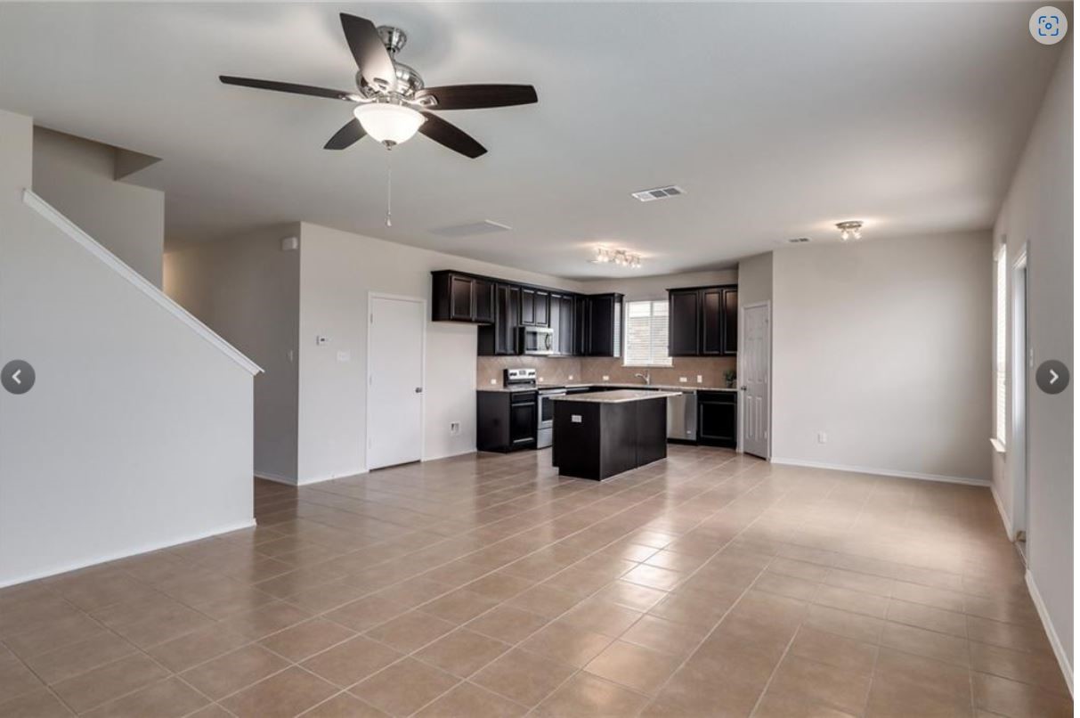 169 Marcheeta Way Leander, TX 78641 - Photo 6 of 30 a view of kitchen with stainless steel appliances a refrigerator and a sink