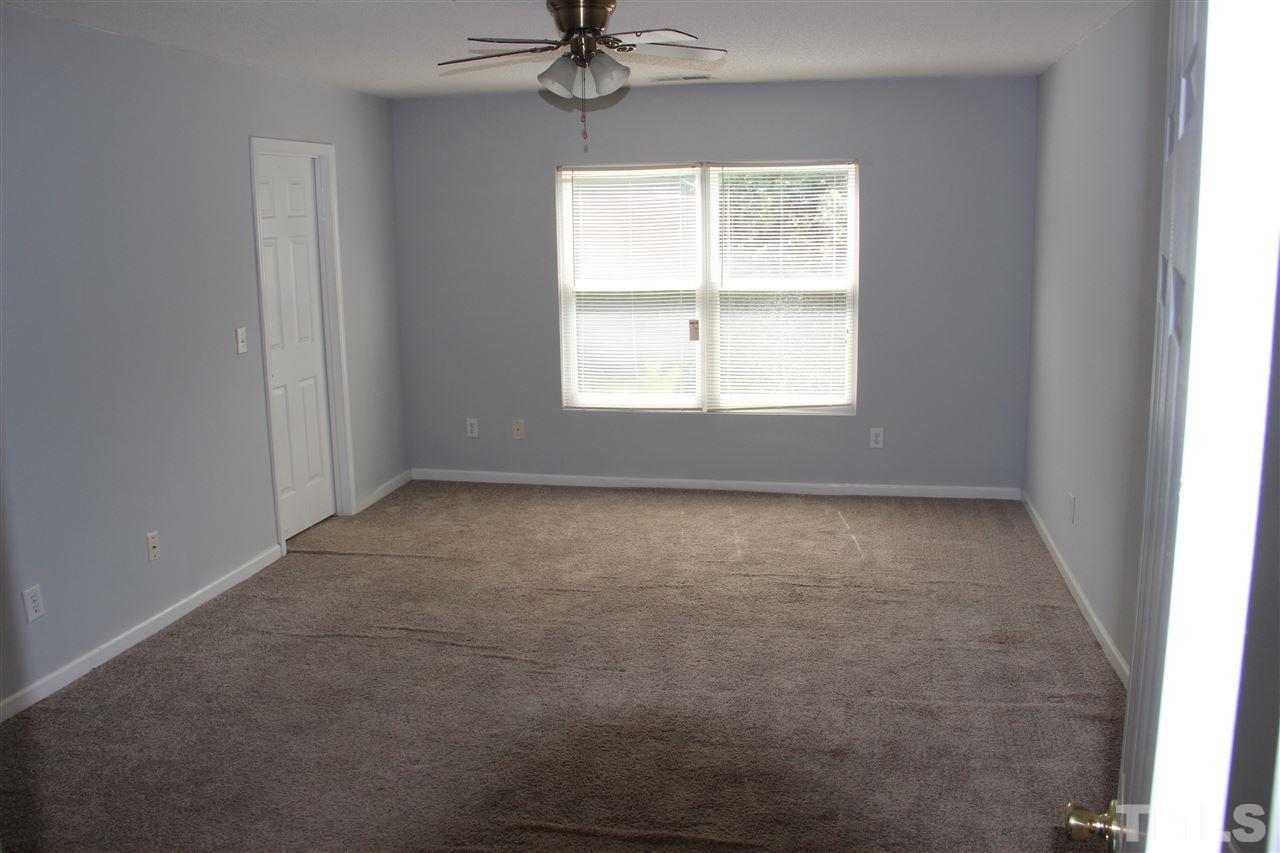 2609 Quarry Ridge Lane Raleigh, NC 27610 - Photo 8 of 12 an empty room with a window