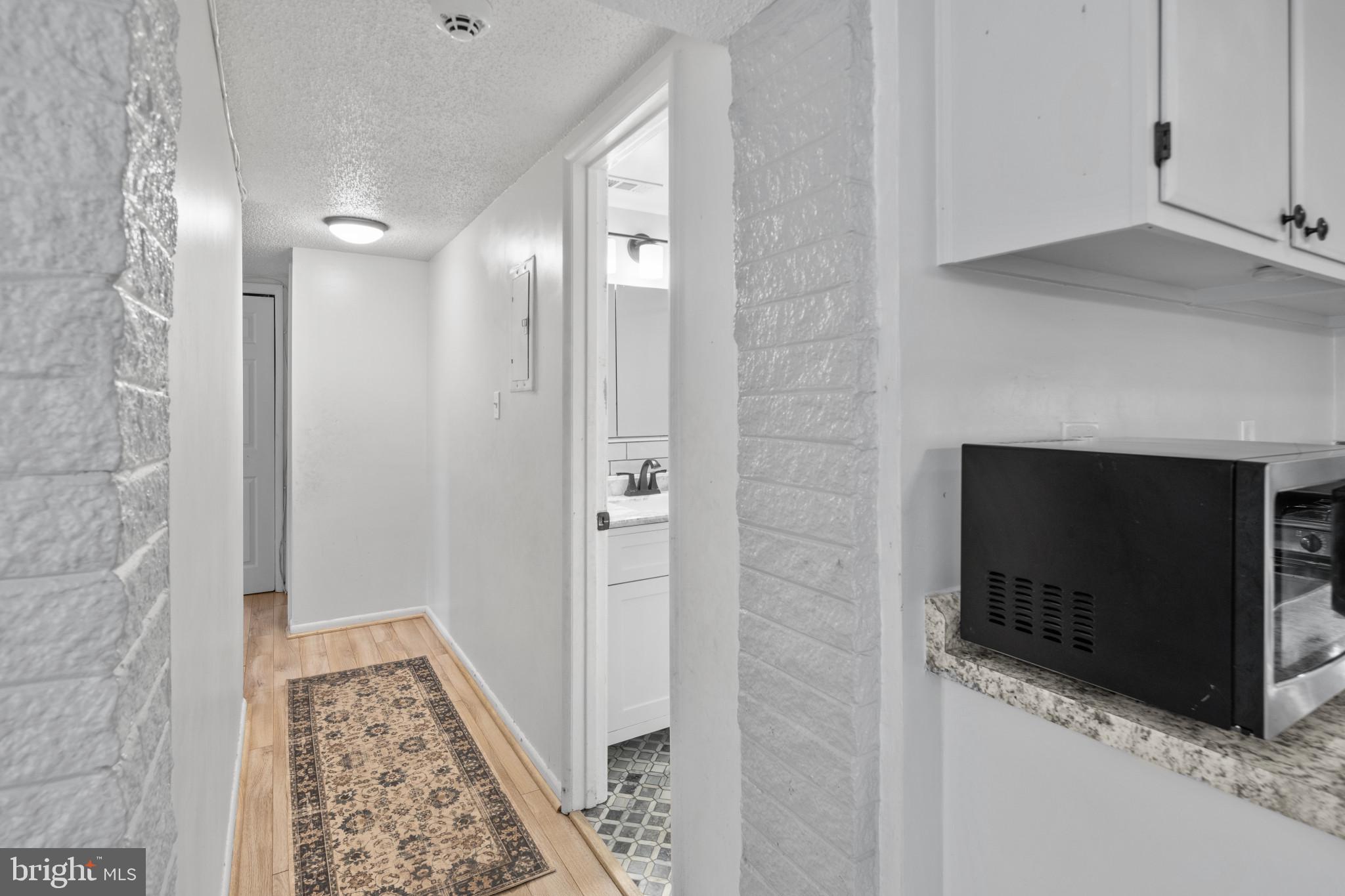1824 Metzerott Road, Unit B5 Adelphi, MD 20783 - Photo 9 of 25 a bathroom with a sink and a mirror