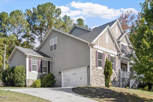 a view of a brick house with a large windows