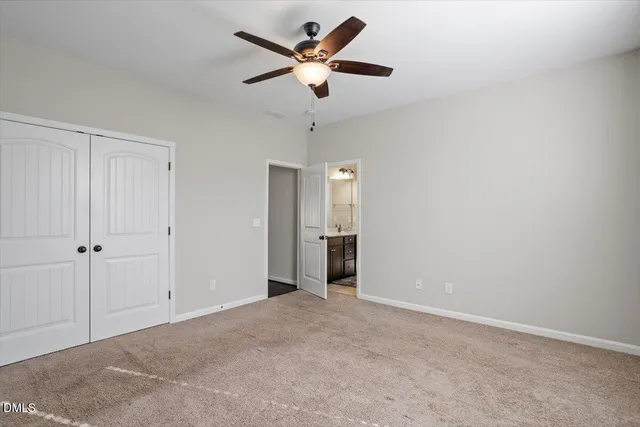 a bathroom with a sink double vanity and a mirror