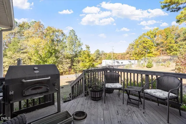 a view of a balcony with chairs