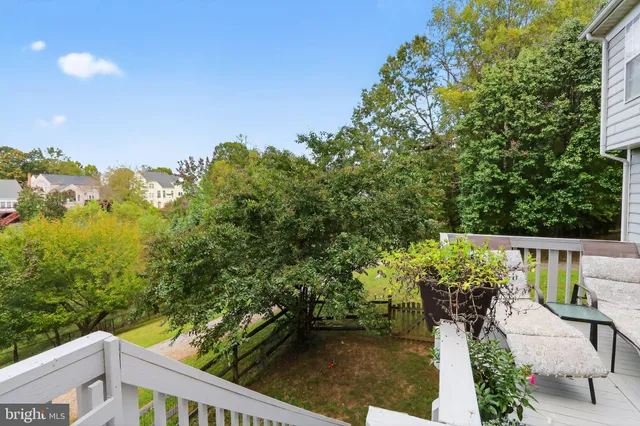 a view of roof deck with furniture