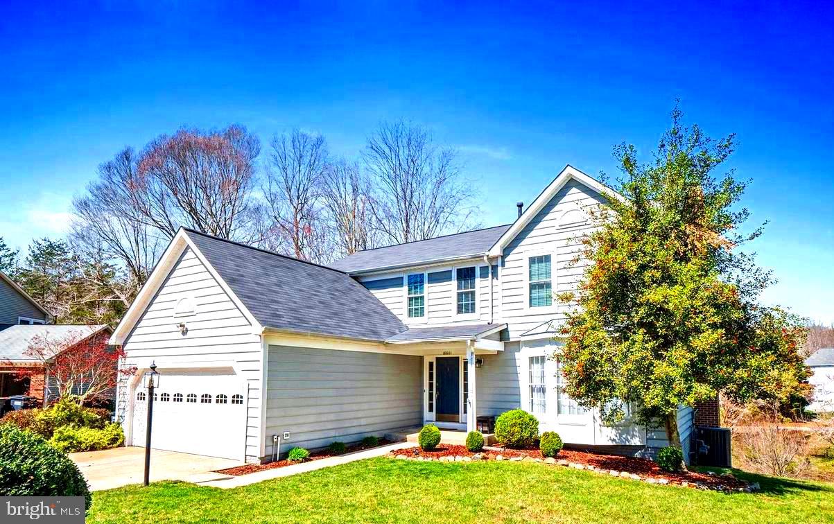 16601 Accolon Court Dumfries, VA 22025 - Photo 2 of 34 a view of a house with a yard