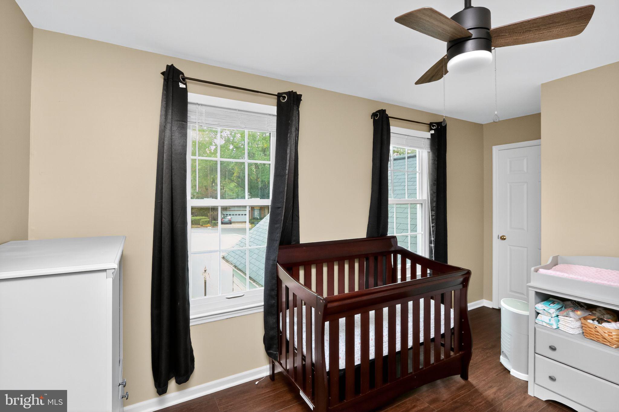16601 Accolon Court Dumfries, VA 22025 - Photo 23 of 34 a bedroom with furniture and a window