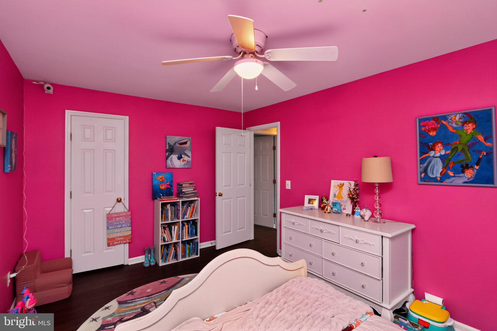 16601 Accolon Court Dumfries, VA 22025 - Photo 28 of 34 a bedroom with furniture and a chandelier