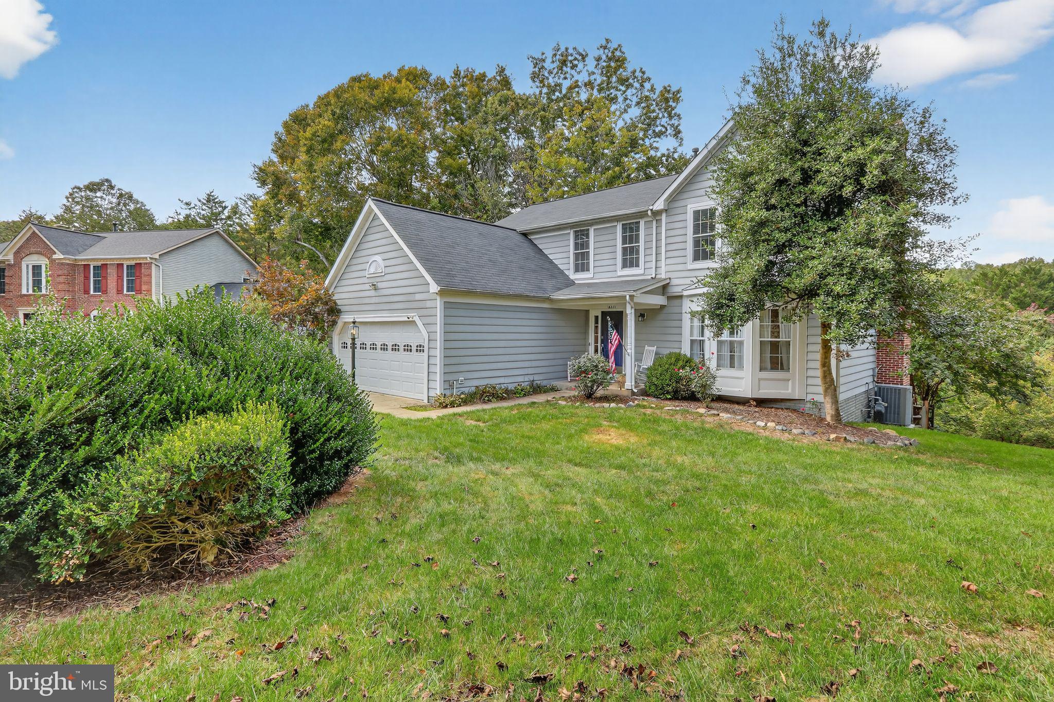 16601 Accolon Court Dumfries, VA 22025 - Photo 4 of 34 a view of a house with a yard