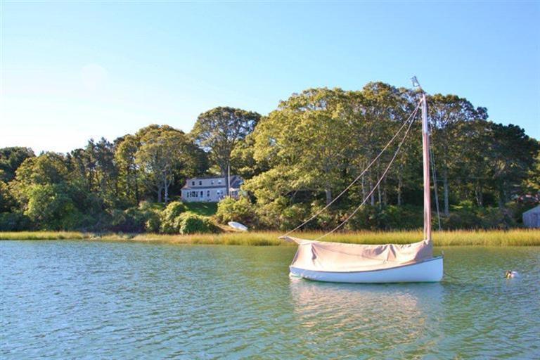 124 Namequoit Road Orleans, MA 02653 - Photo 24 of 30 a view of a lake with a yard