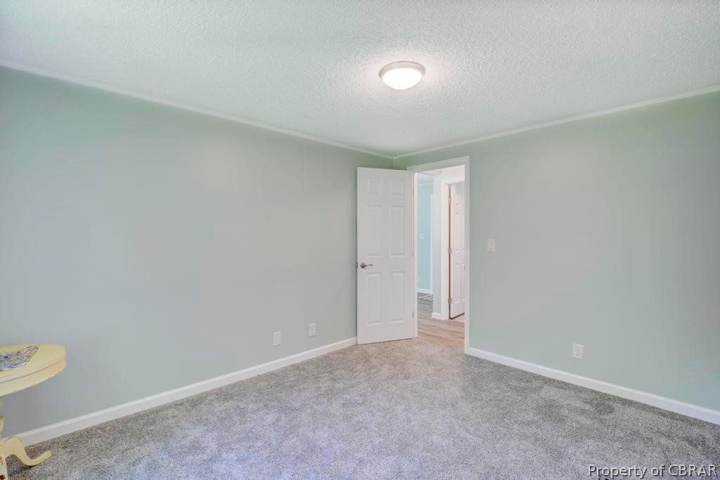 1626 Buckley Hall Road Dutton, VA 23050 - Photo 25 of 37 a view of an empty room