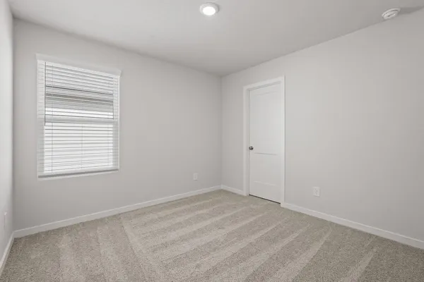 a view of a room that has a window in it
