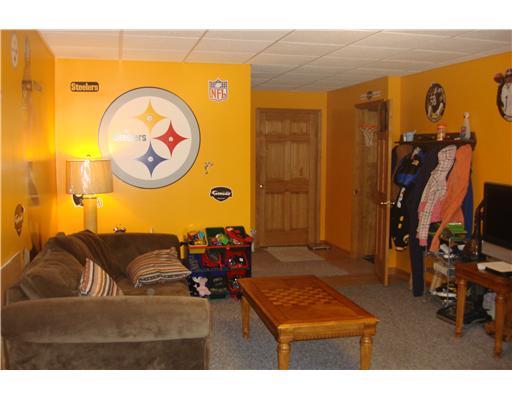 2320 Savannah Road New Castle, PA 16101 - Photo 12 of 17 Den/Family/Great Room. Lower level of the home.