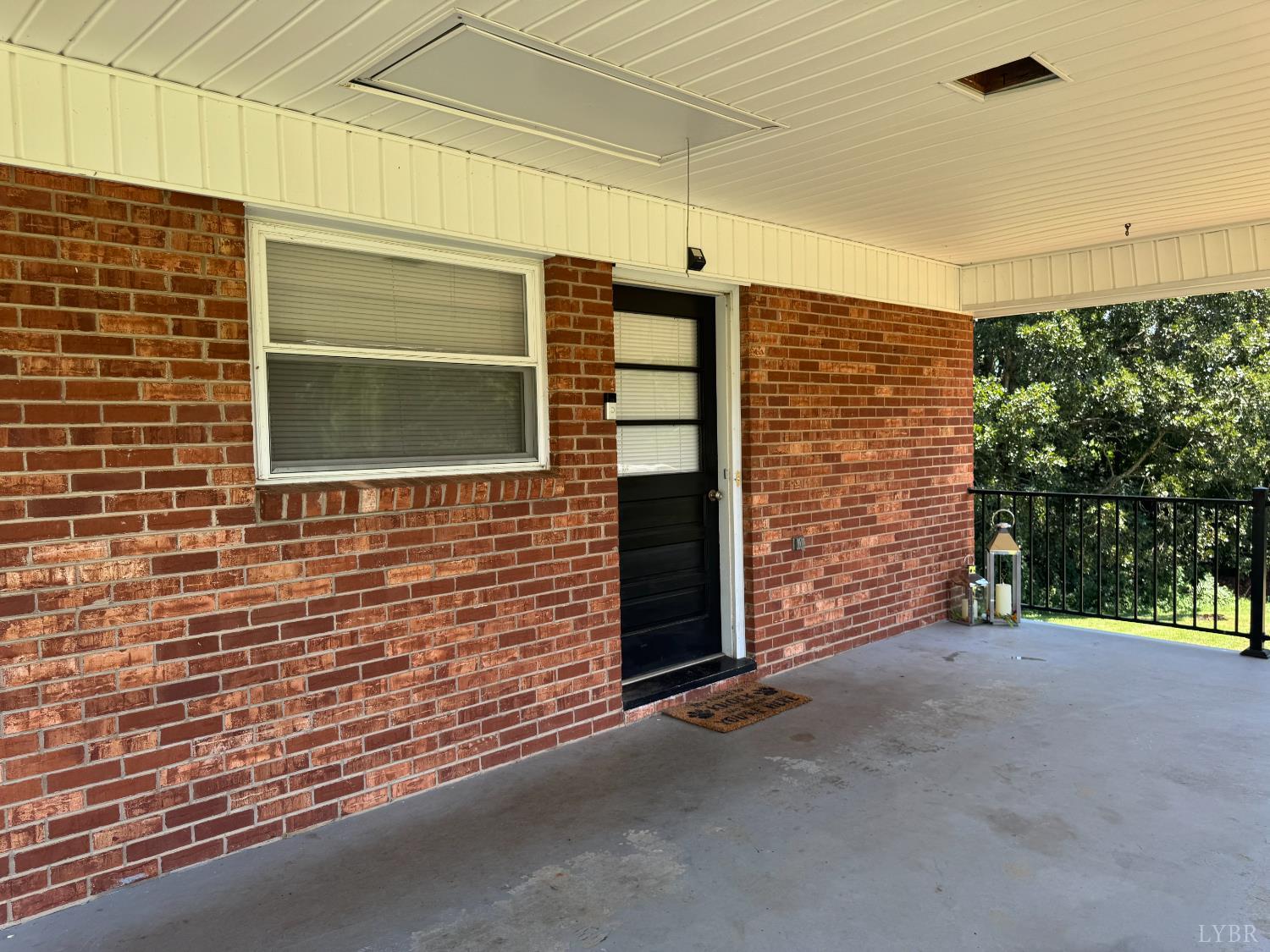 108 Hillside Road Hurt, VA 24563 - Photo 27 of 28 a view of front door and wooden door