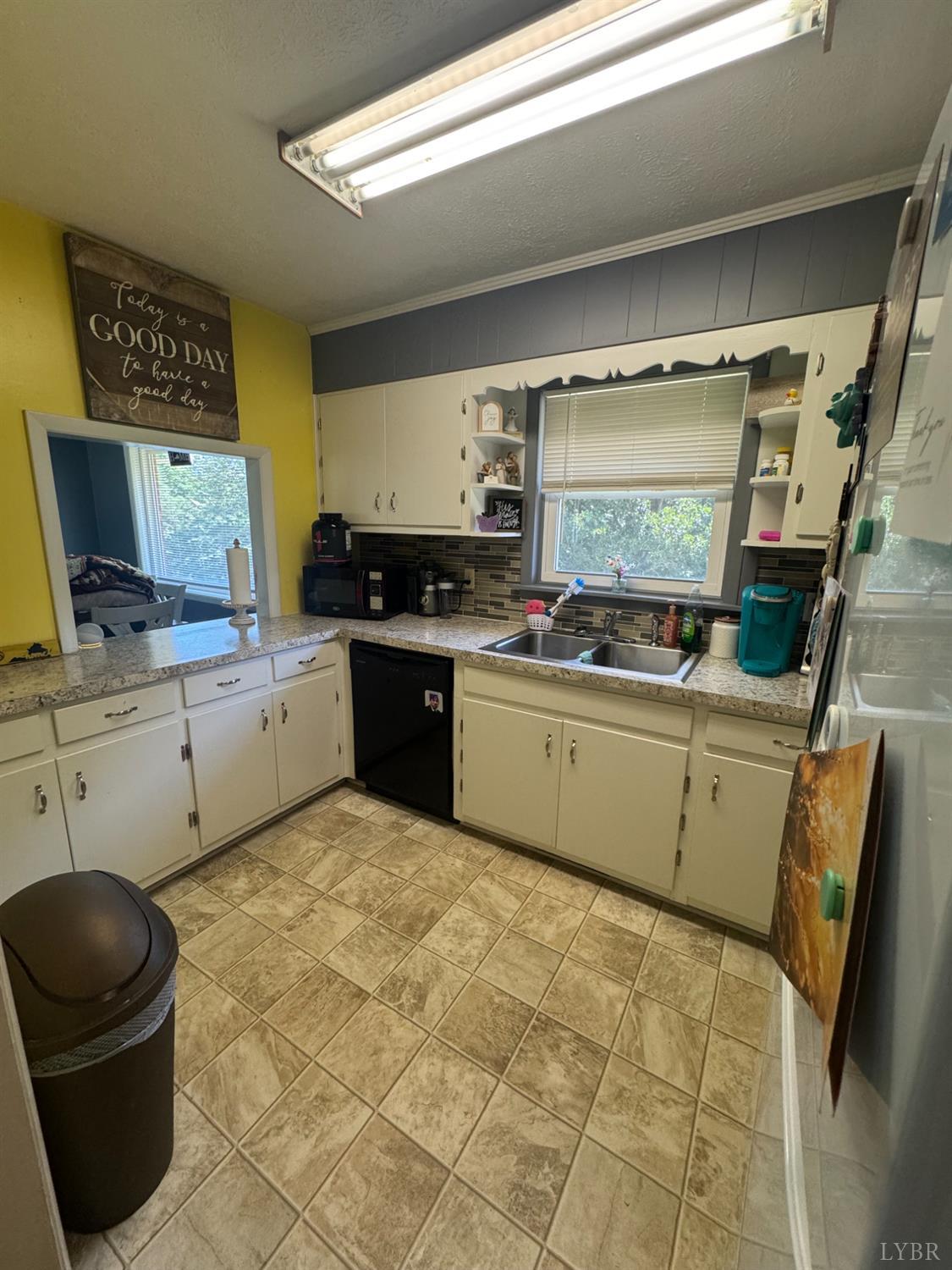 108 Hillside Road Hurt, VA 24563 - Photo 4 of 28 a kitchen with a sink appliances and cabinets