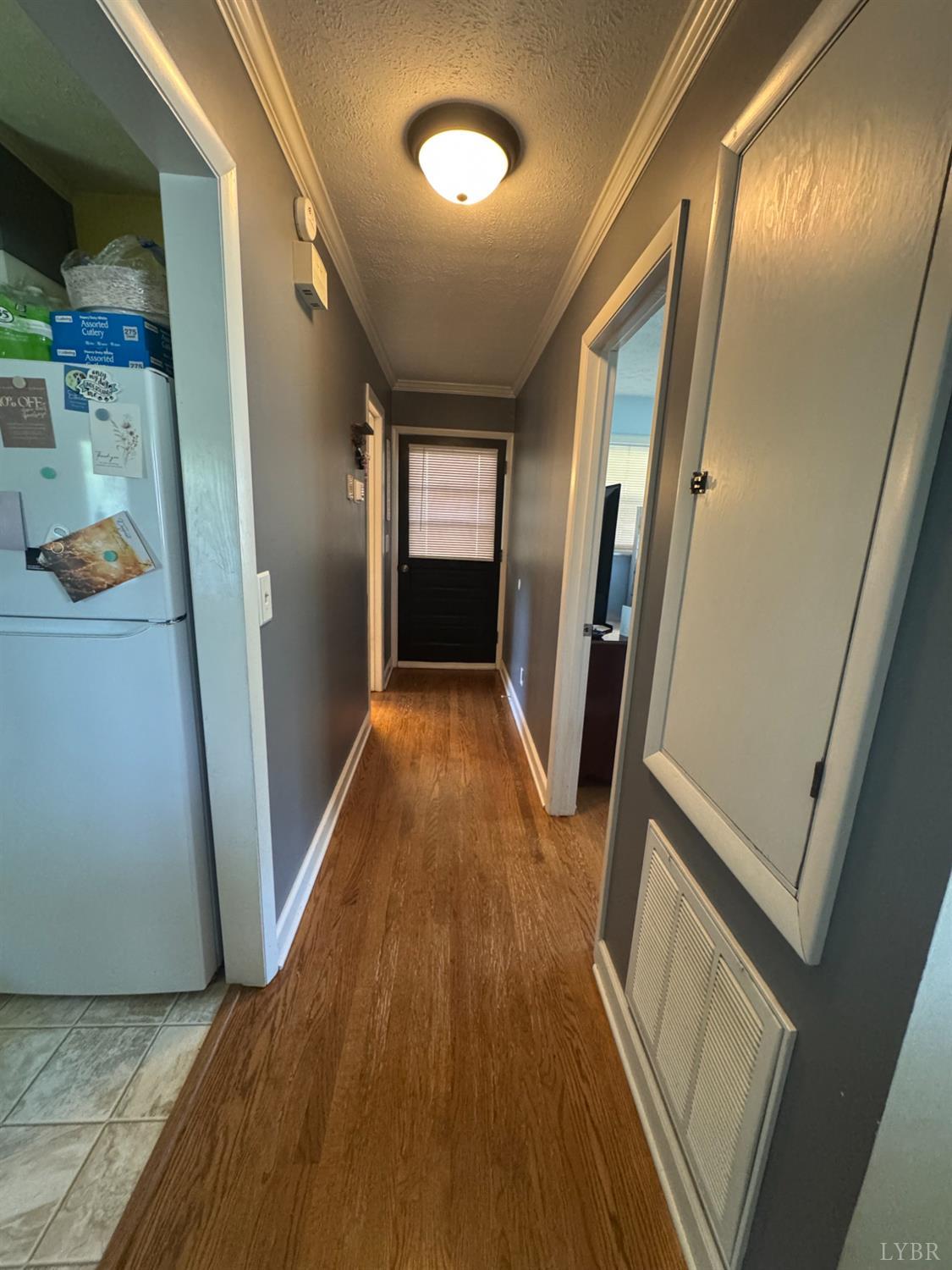 108 Hillside Road Hurt, VA 24563 - Photo 6 of 28 a view of an entryway with wooden floor