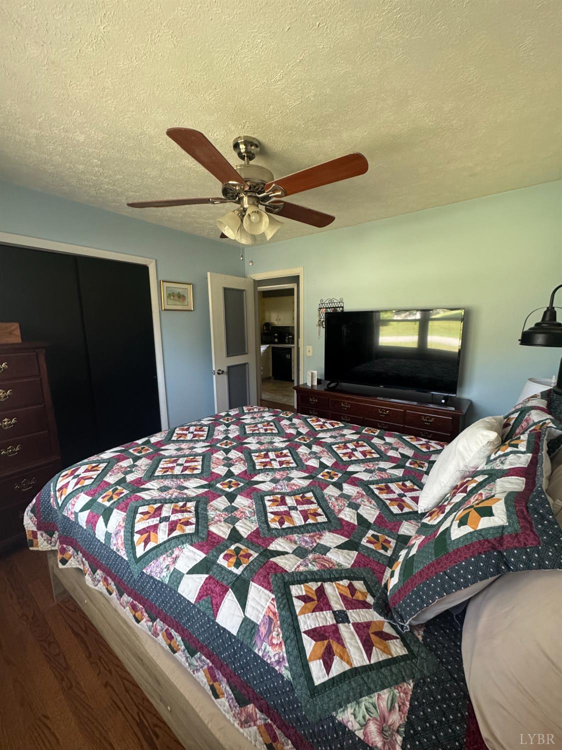 108 Hillside Road Hurt, VA 24563 - Photo 9 of 28 a bedroom with a bed and a flat screen tv