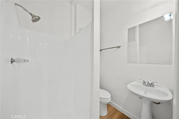 a view of house with outdoor space and garden