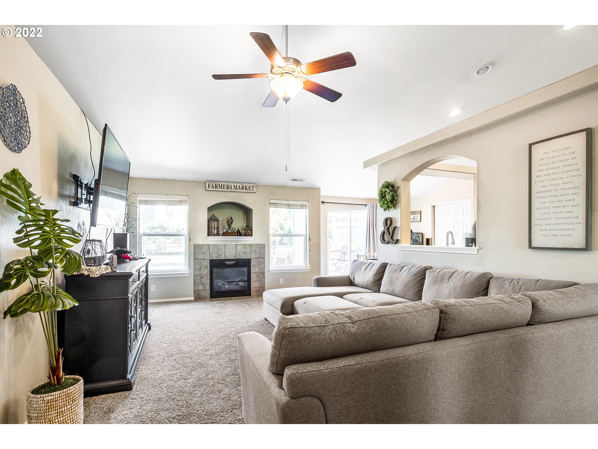 6030 Quartz Avenue Springfield, OR 97478 - Photo 5 of 26 a living room with furniture fireplace and a large window