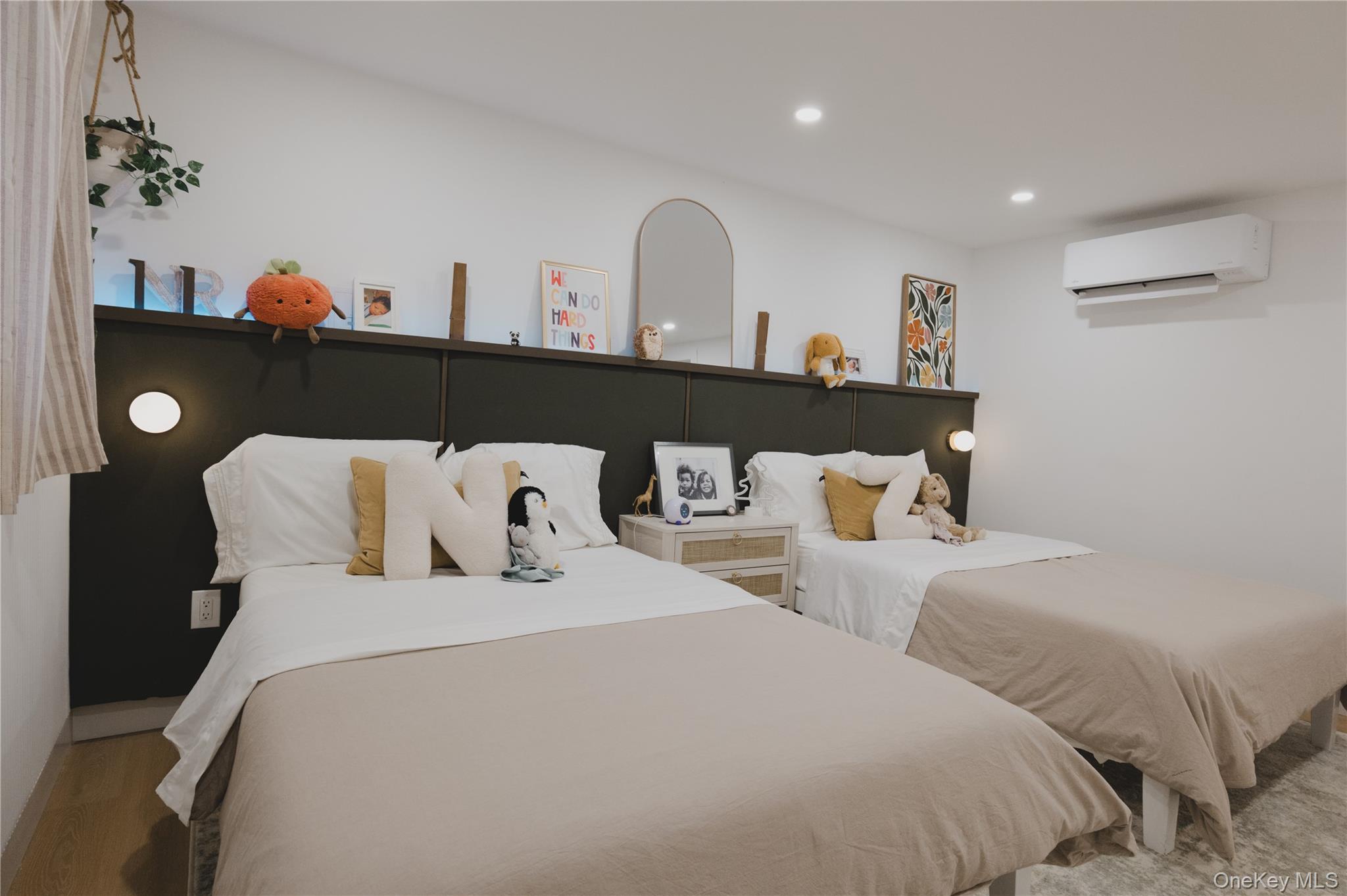 281 Falls Road Hudson, NY 12534 - Photo 15 of 27 a bedroom with bed and a painting on the wall