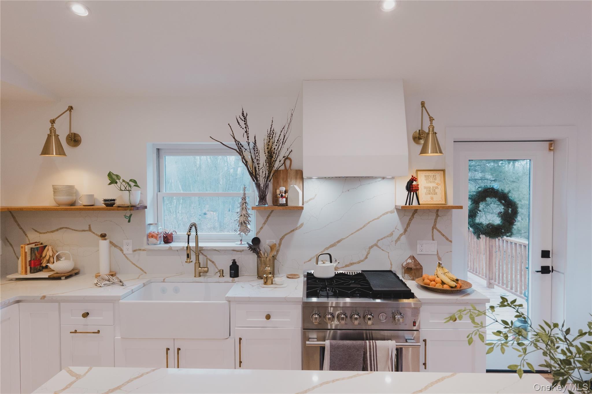 281 Falls Road Hudson, NY 12534 - Photo 2 of 27 a kitchen with stainless steel appliances kitchen island a stove and a sink