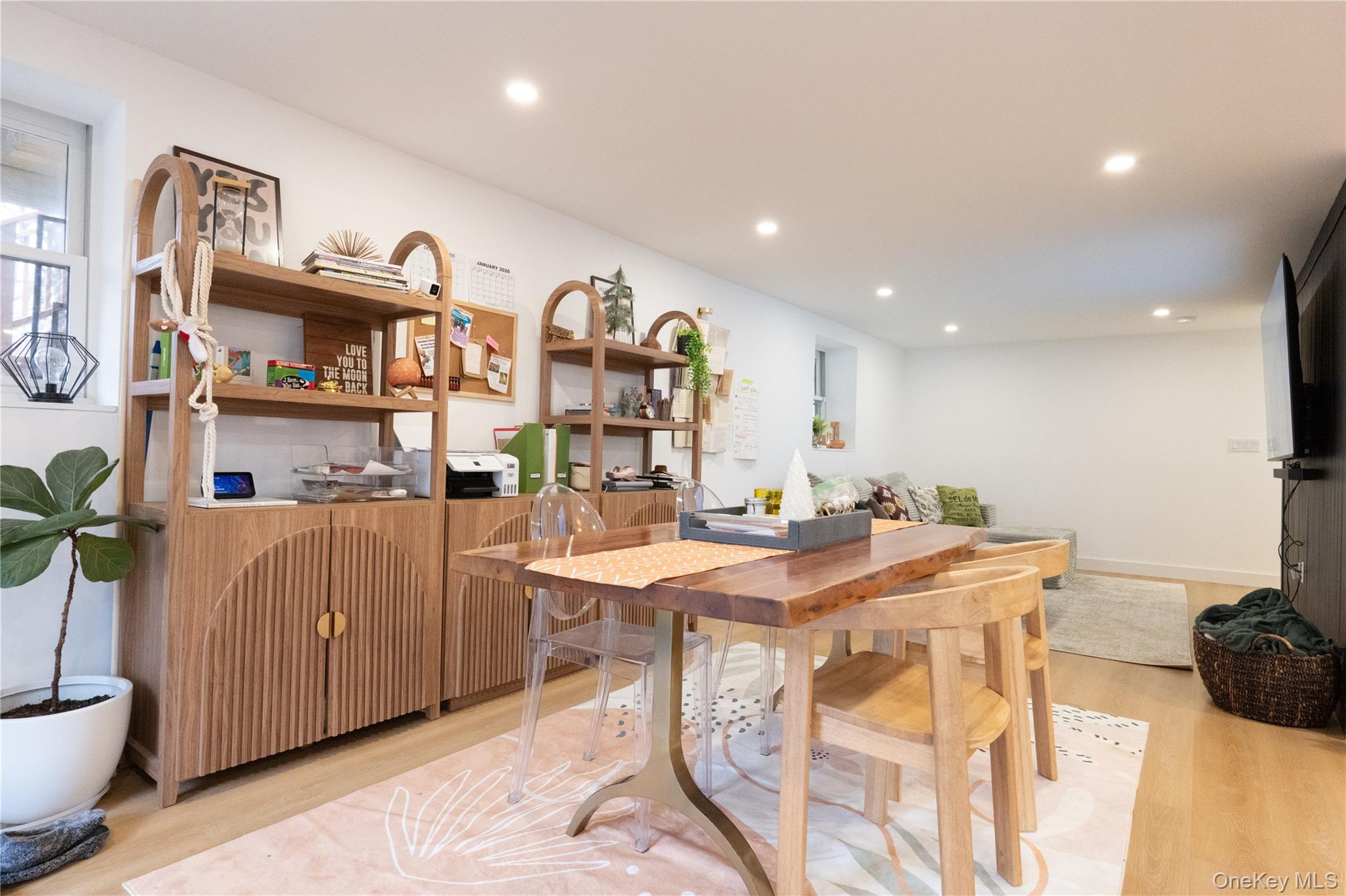 281 Falls Road Hudson, NY 12534 - Photo 21 of 27 a kitchen with stainless steel appliances granite countertop a table and chairs in it