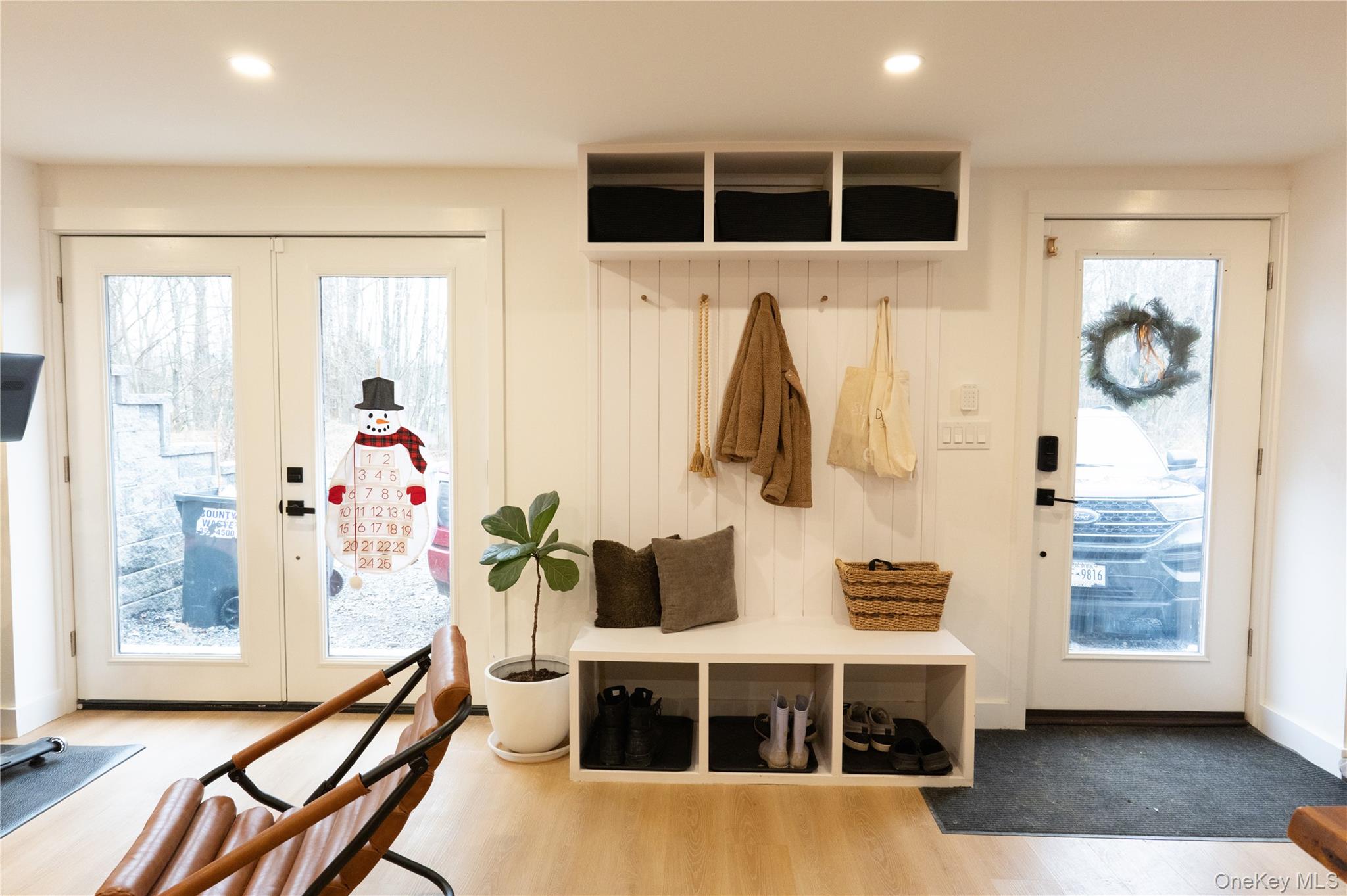 281 Falls Road Hudson, NY 12534 - Photo 22 of 27 a living room with furniture windows and wooden floor