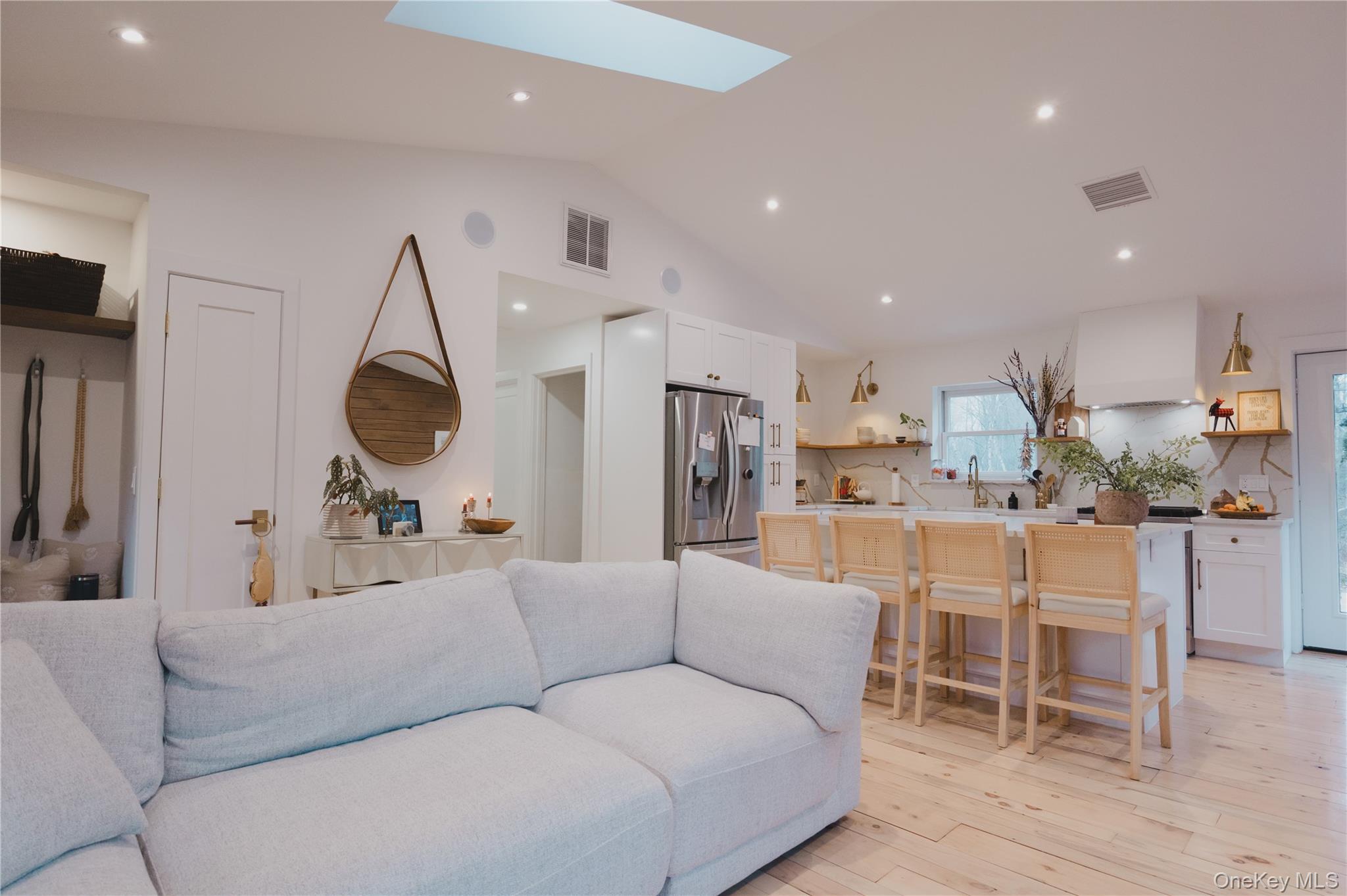 281 Falls Road Hudson, NY 12534 - Photo 5 of 27 a living room filled with furniture and a large window