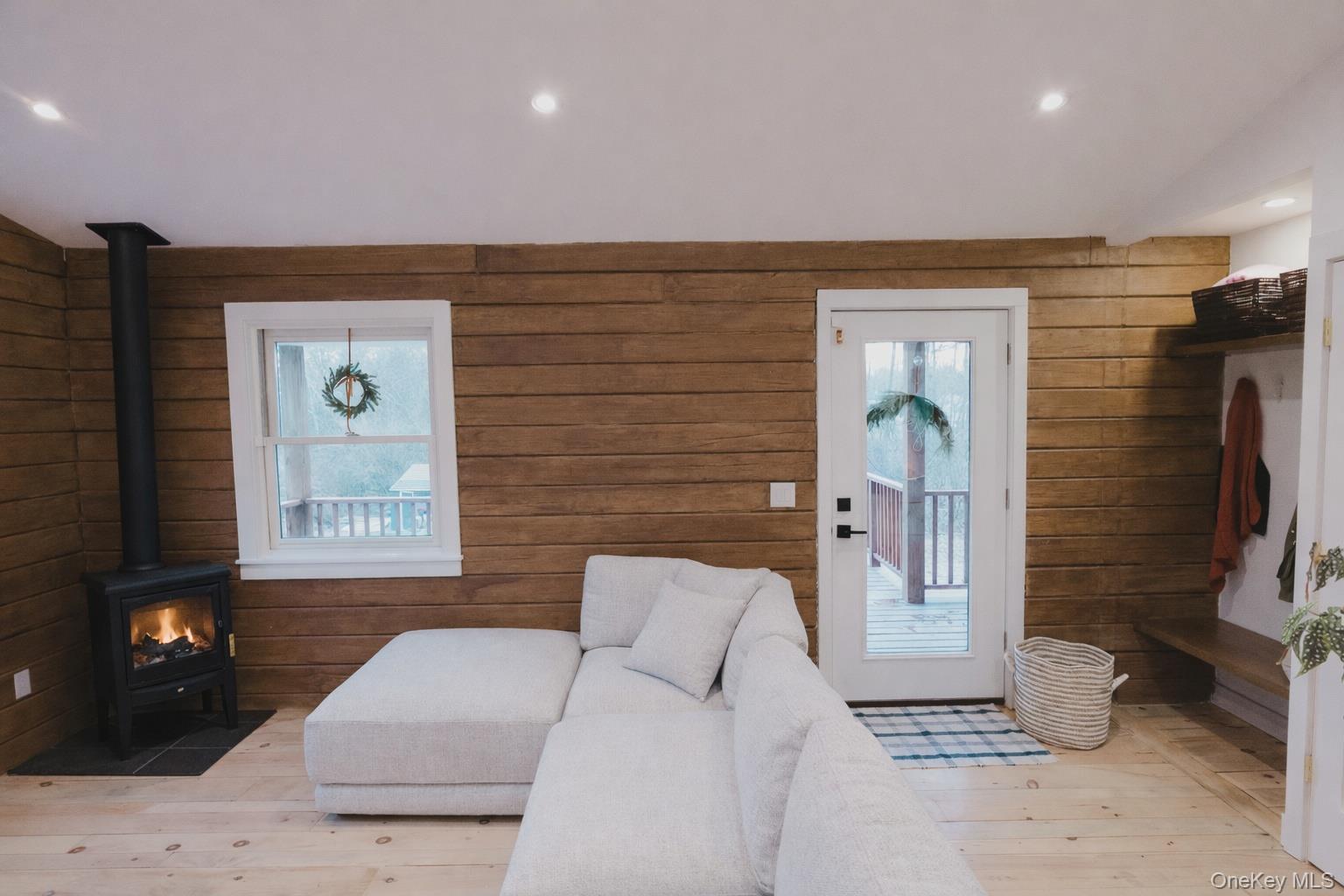 281 Falls Road Hudson, NY 12534 - Photo 6 of 27 a living room with furniture and a flat screen tv