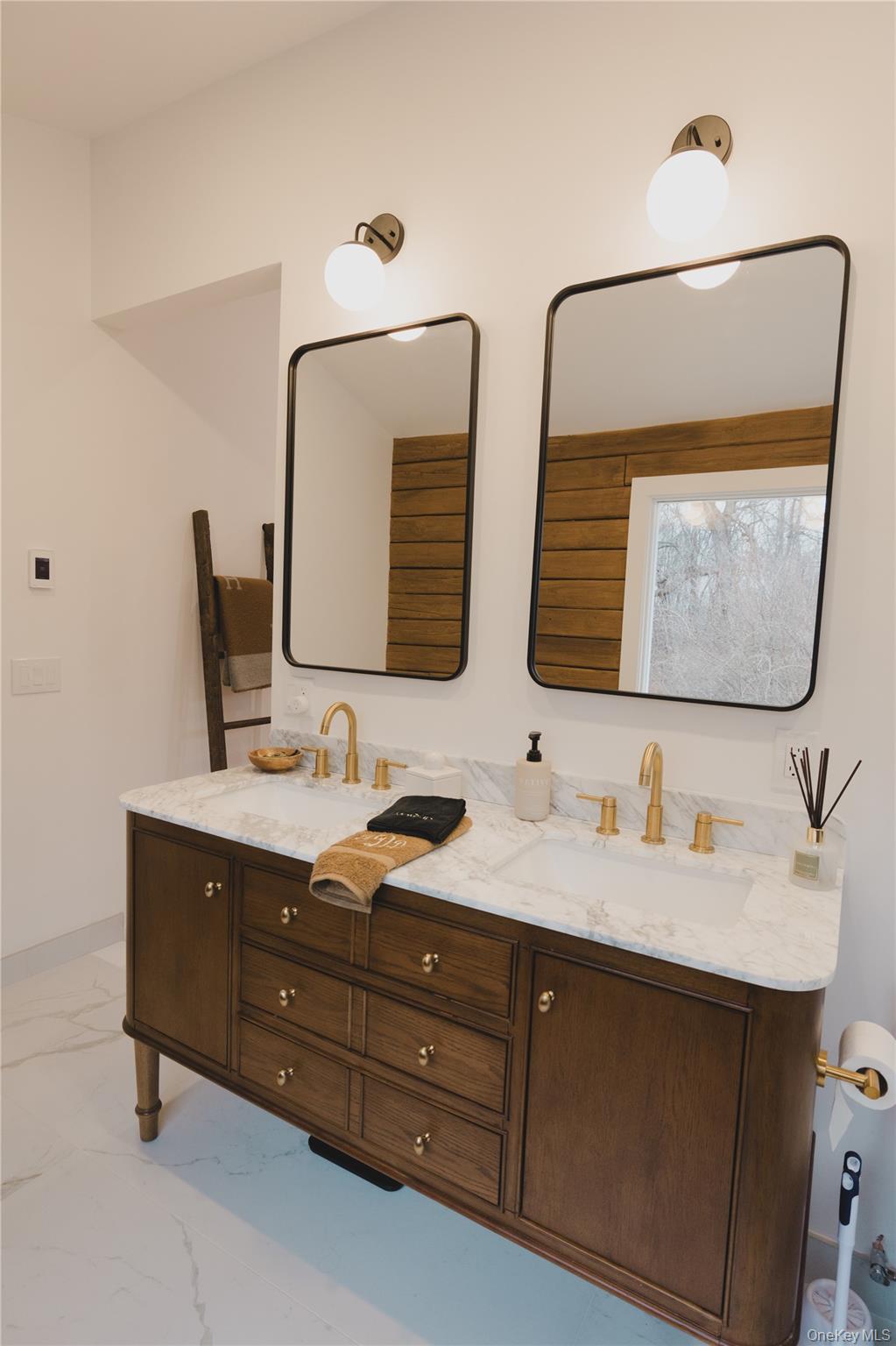 281 Falls Road Hudson, NY 12534 - Photo 9 of 27 a bathroom with double vanity sink and two mirror
