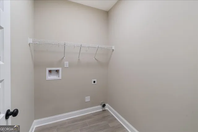 a view of a room with an empty space