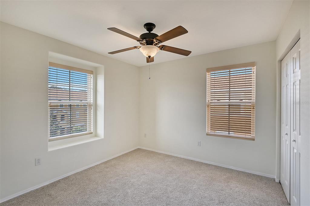 8922 White Sage Loop Lakewood Ranch, FL 34202 - Photo 28 of 65 a view of an empty room with a window