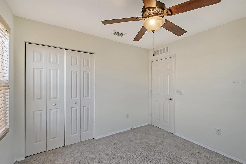 8922 White Sage Loop Lakewood Ranch, FL 34202 - Photo 29 of 65 wooden floor in an empty room