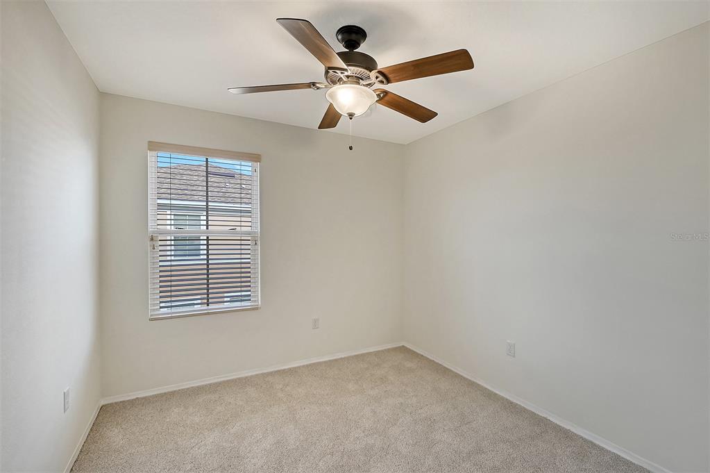 8922 White Sage Loop Lakewood Ranch, FL 34202 - Photo 34 of 65 an empty room with a window