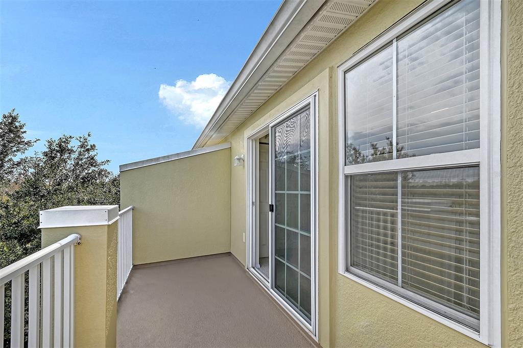 8922 White Sage Loop Lakewood Ranch, FL 34202 - Photo 47 of 65 a view of a house with backyard and wooden fence