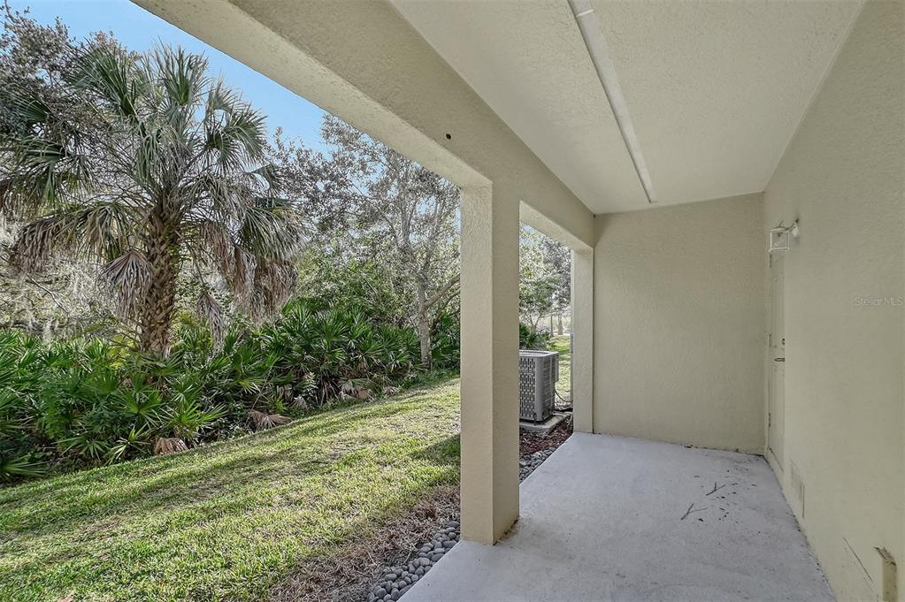 8922 White Sage Loop Lakewood Ranch, FL 34202 - Photo 52 of 65 a view of a yard from a balcony