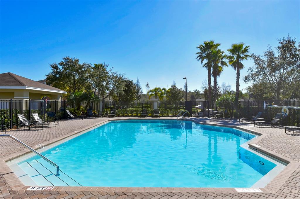 8922 White Sage Loop Lakewood Ranch, FL 34202 - Photo 56 of 65 a view of a swimming pool with lounge chair