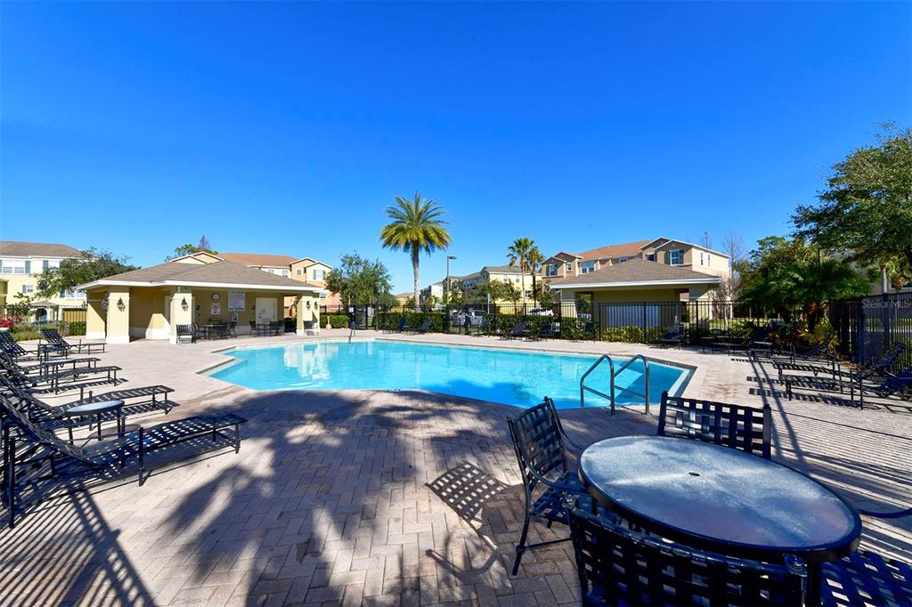 8922 White Sage Loop Lakewood Ranch, FL 34202 - Photo 58 of 65 a view of a patio with swimming pool