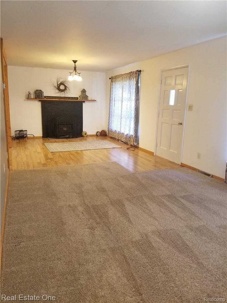 4229 West Allen Road Howell, MI 48855 - Photo 15 of 18 Allen Rd 2.0 fireplace living 2