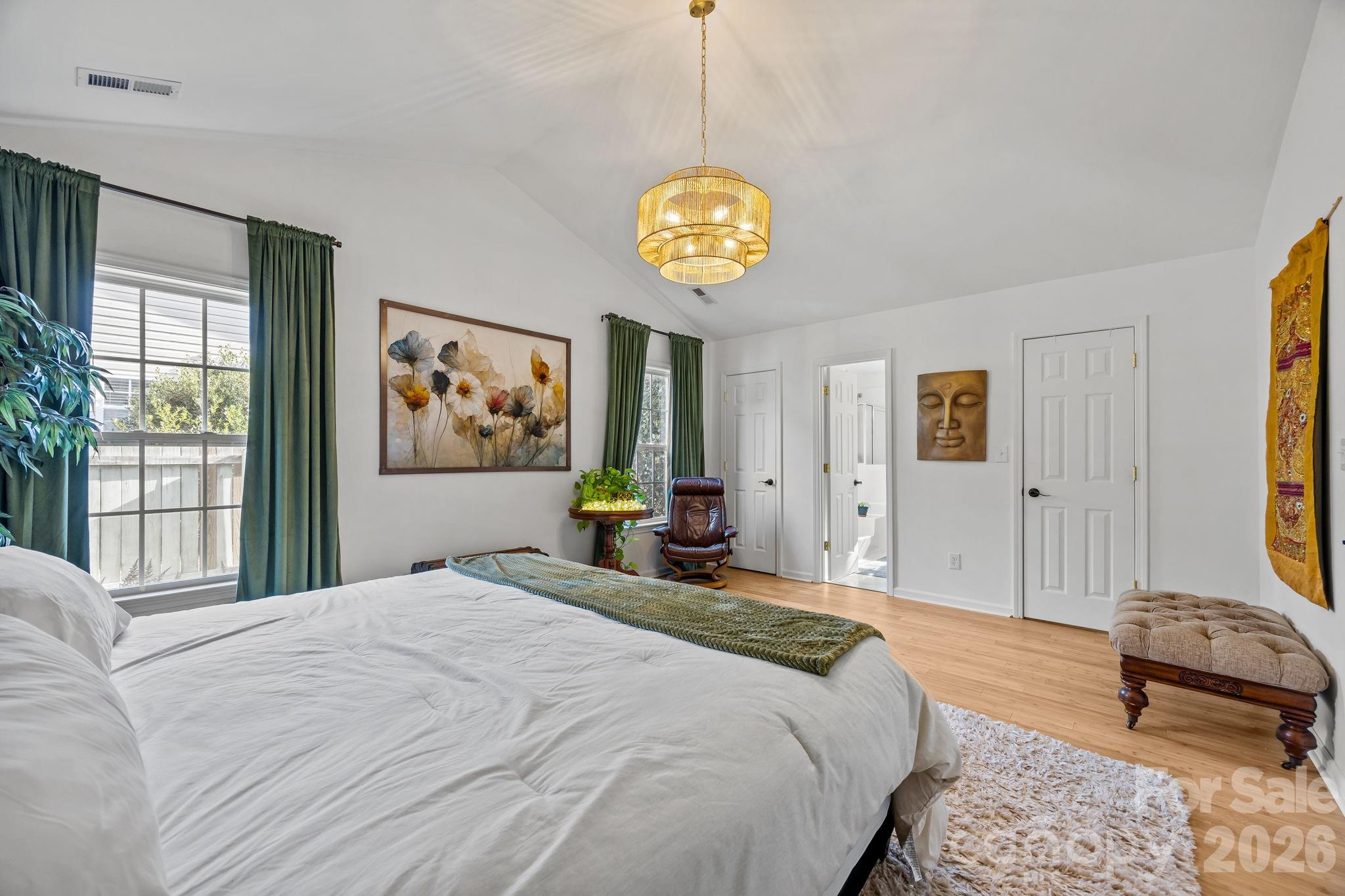 244 Running Briar Road Fletcher, NC 28732 - Photo 23 of 45 a bedroom with a bed and a window