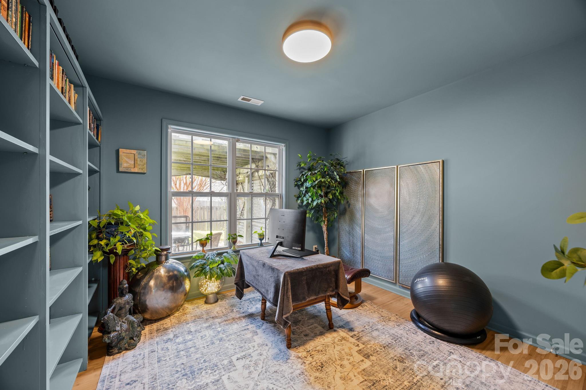 244 Running Briar Road Fletcher, NC 28732 - Photo 30 of 45 a living room with furniture and a potted plant