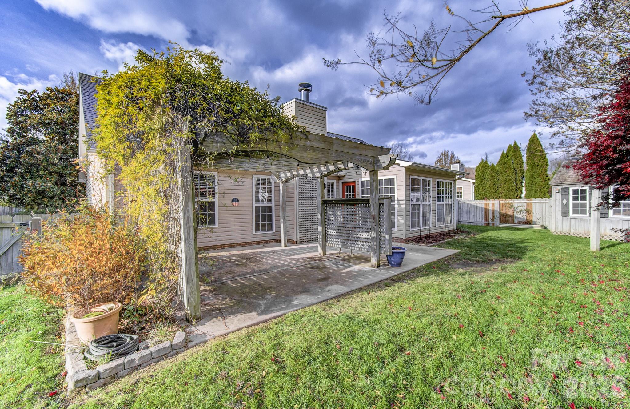 244 Running Briar Road Fletcher, NC 28732 - Photo 35 of 45 front view of a house with a yard