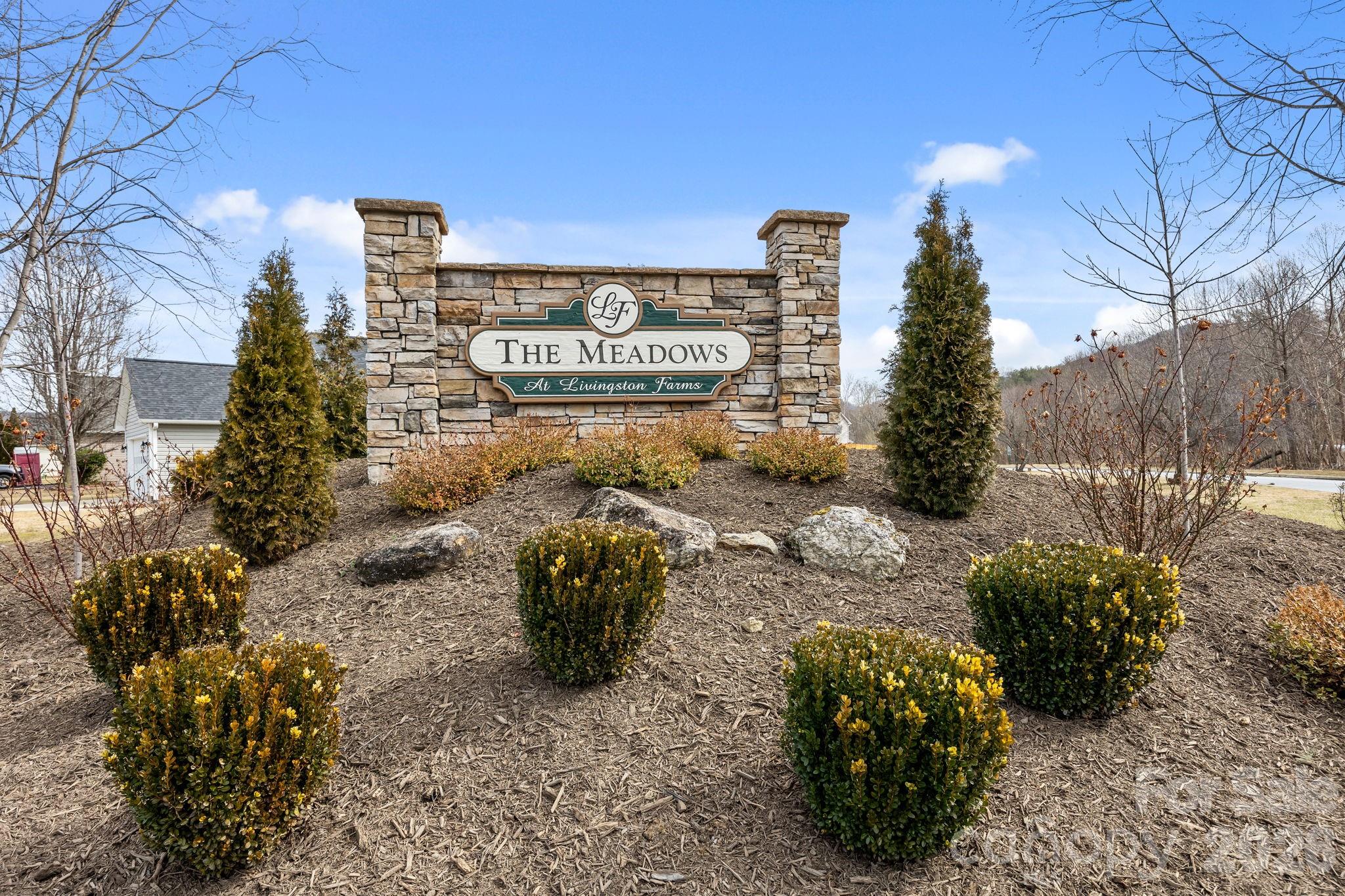 244 Running Briar Road Fletcher, NC 28732 - Photo 42 of 45 a sign that is sitting in the middle of a yard